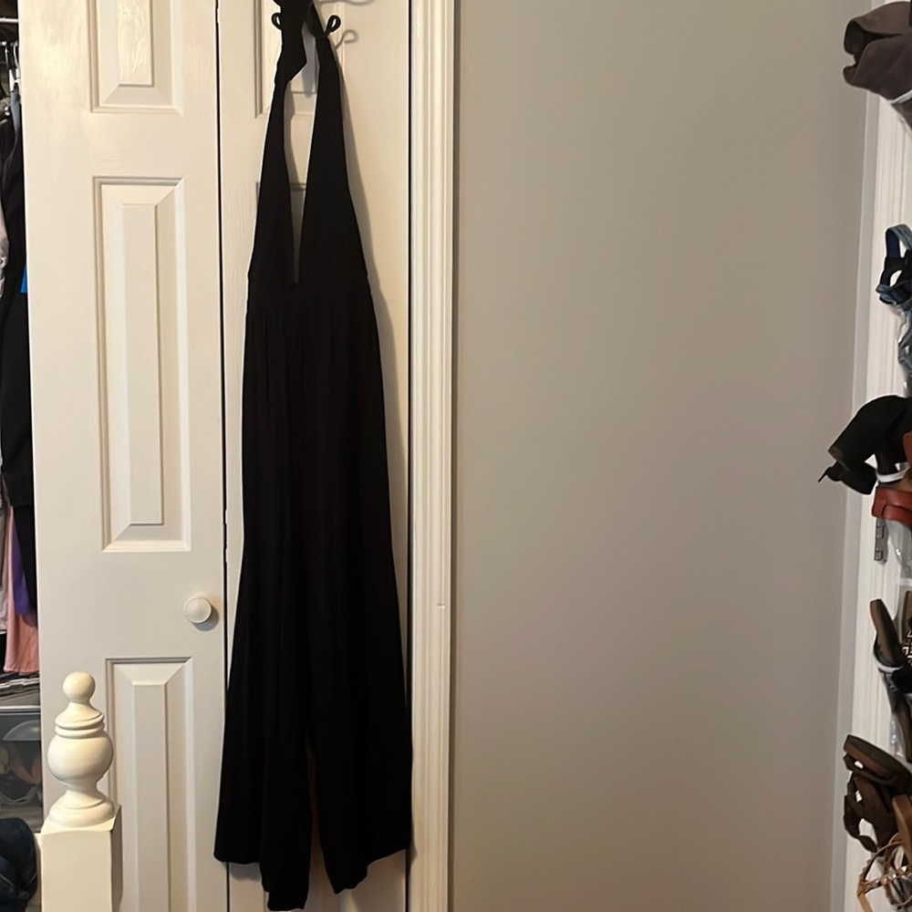 Black jumpsuit halter style with open back!